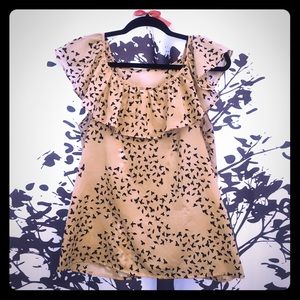 Bird print blouse with ruffled neckline